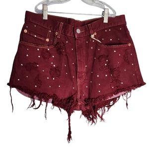Levi's women's burgundy mini distressed jeans shorts.